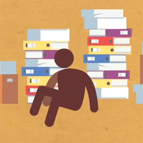 Stick figure surrounded by paper files.